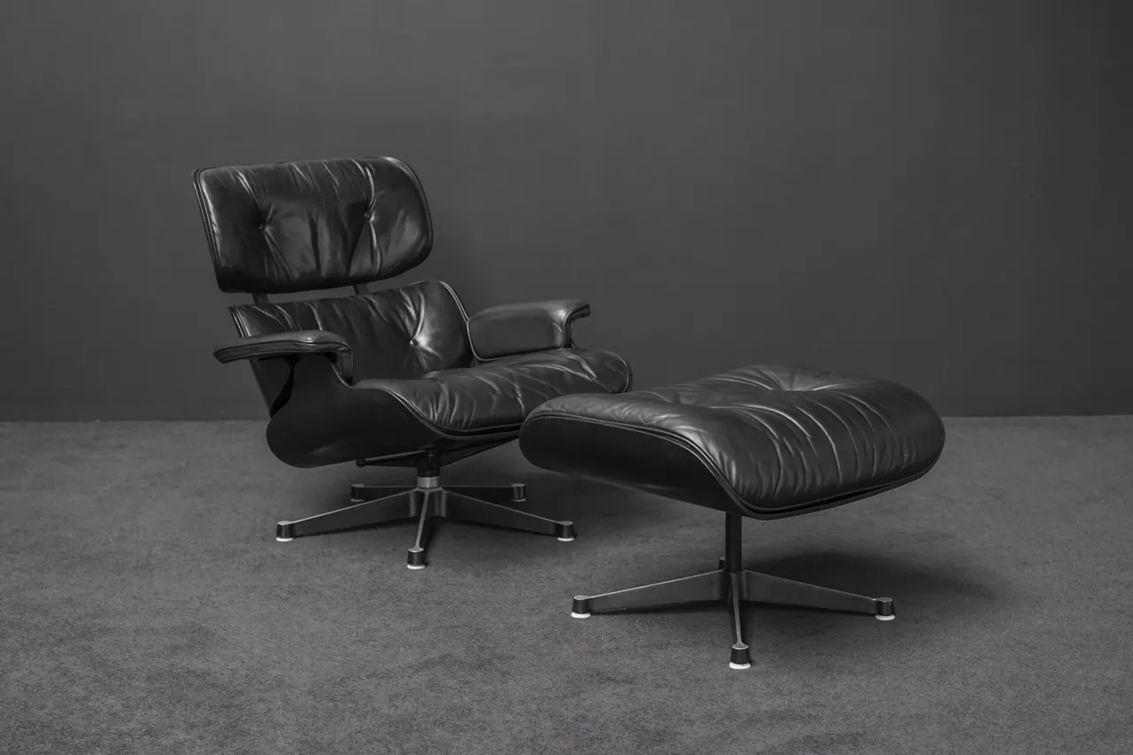 Herman Miller by Vitra Lounge Chair + Ottomane Leder Schwarz — Bild 1